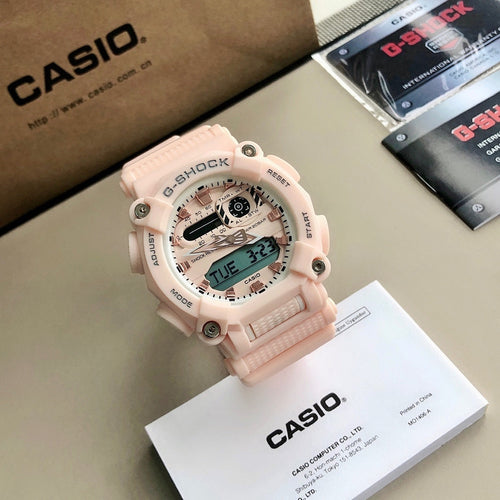 Casio G-Shock digital watch with light pink resin strap and round dial, front view