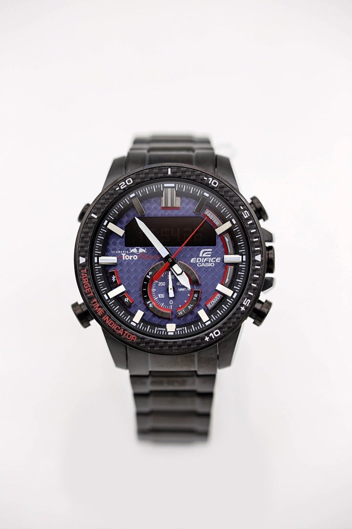 Casio watch front view, black bracelet and black dial with red accents and subdials.