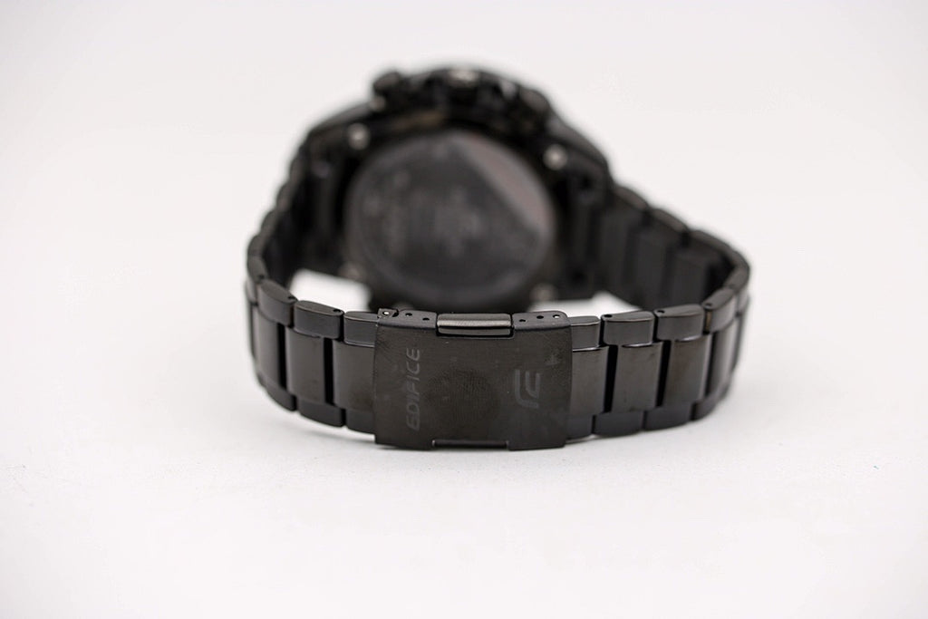 Casio watch bracelet, black link metal band with clasp at the center.