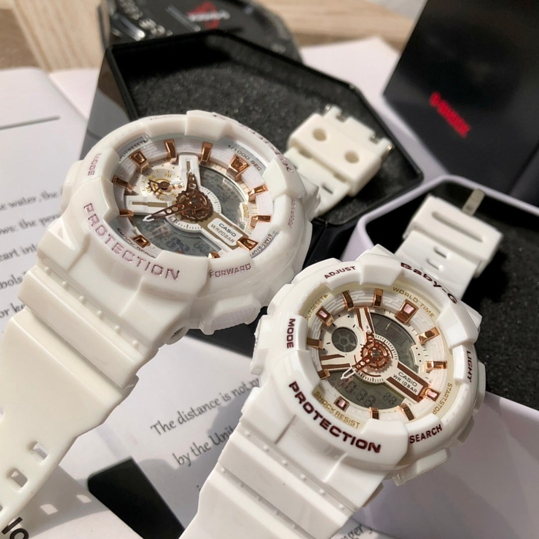 Casio watches with white resin straps and gold-toned multi-dial faces, side-by-side