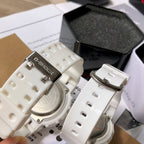 Casio watch straps and metal buckles, white resin with round case backs visible