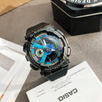 Casio watch with black strap and metal bezel, blue multi-dial face and sporty markings