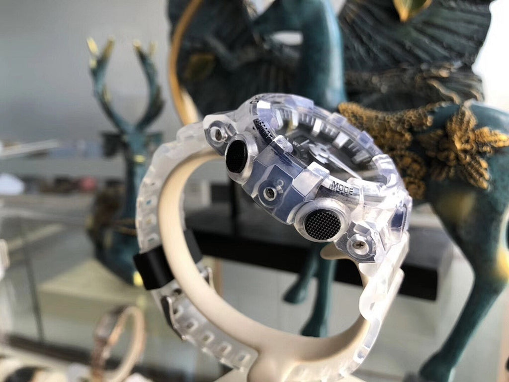 Casio G-Shock watch side view with clear bezel and metal details