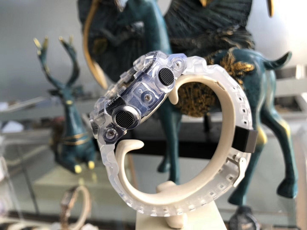 Casio G-Shock watch side view with buttons and clear resin strap loop