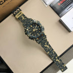 Blue camo resin wristwatch with black dial, gold markers, and chunky bezel