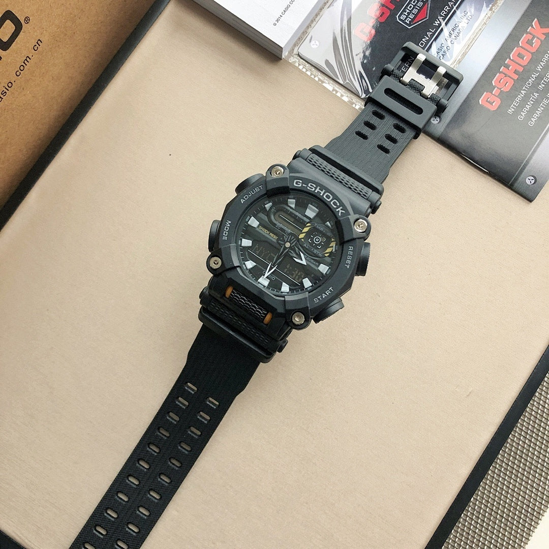 Casio G-Shock wristwatch with black dial and black perforated strap