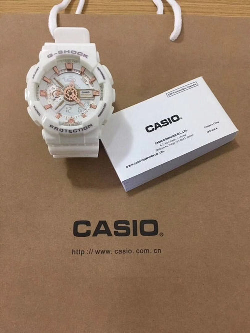 G-Shock watch with white resin strap and white dial, multiple subdials.