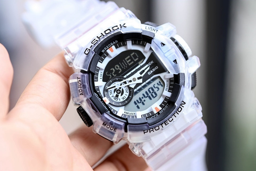 Casio G-Shock watch with translucent white case and black dial, multi-function subdials
