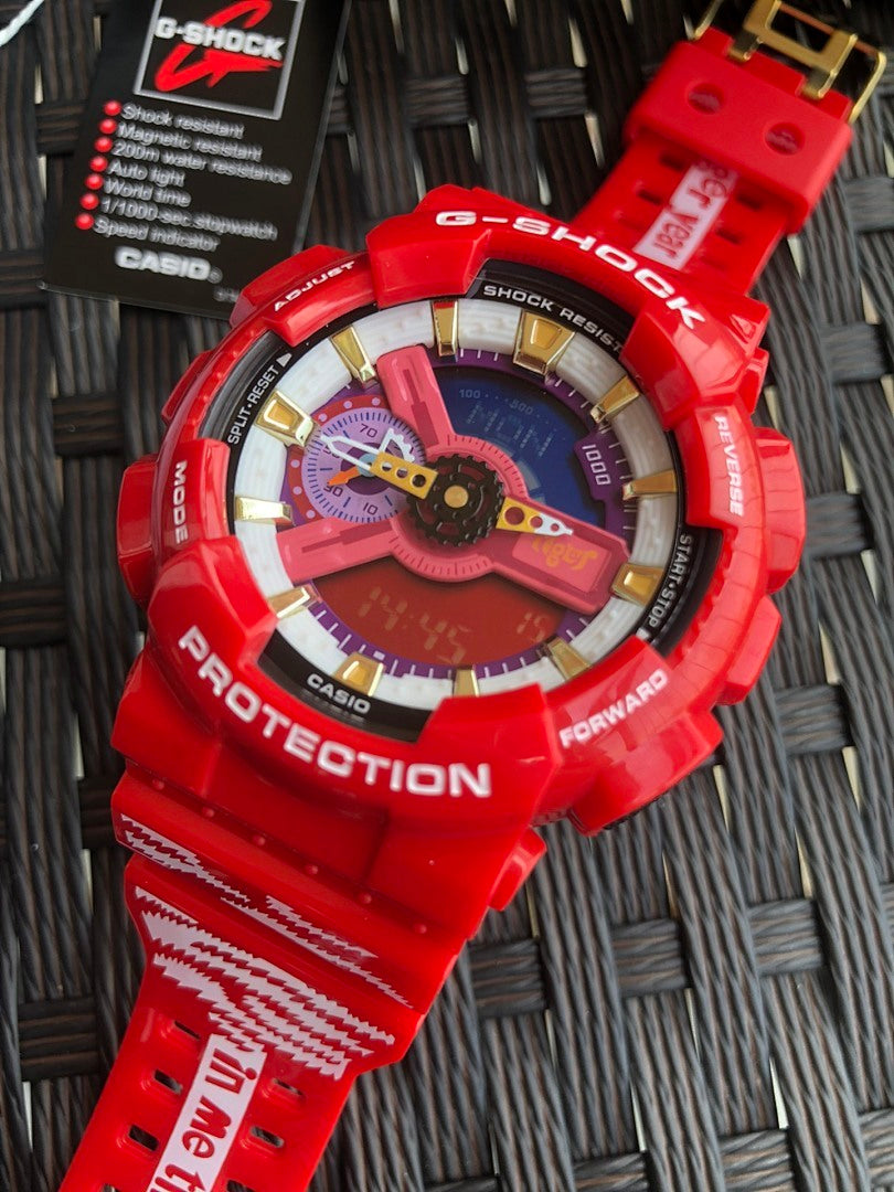 Red Casio G-Shock wristwatch face with gold accents and PROTECTION lettering