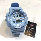 Casio G-Shock watch with blue resin strap and round analog-digital face
