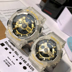 Casio watch pair with clear resin straps and gold skeleton dials, angled front view