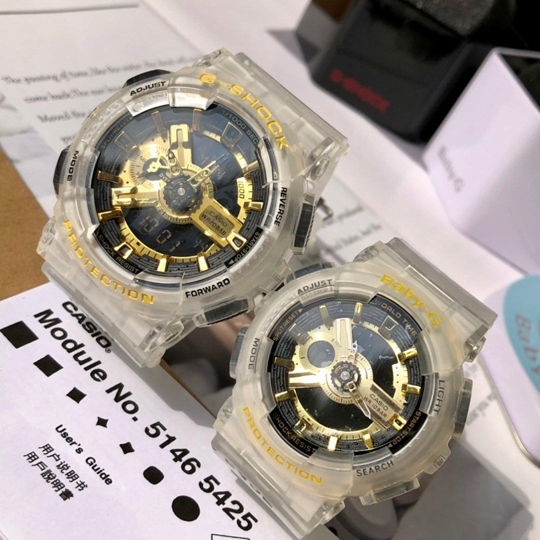 Casio watch pair with clear resin straps and gold skeleton dials, angled front view