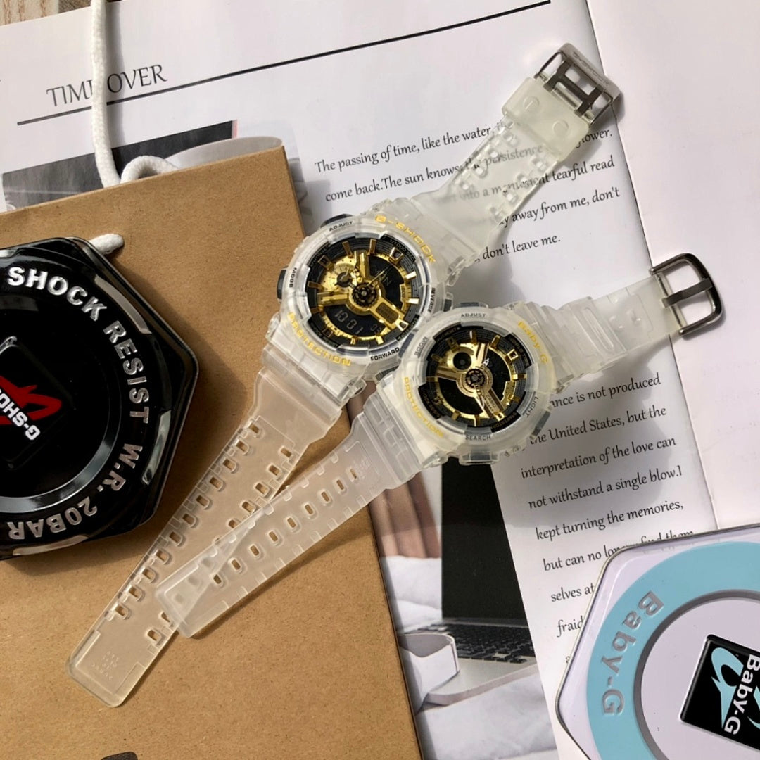 Casio watch with clear resin strap and gold skeleton dial on cardboard packaging