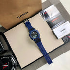 Casio G-Shock watch with blue resin strap and black dial, in display set