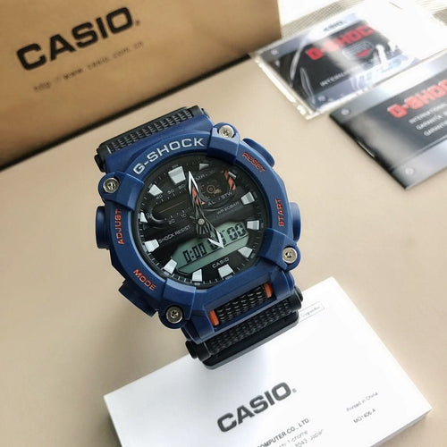 Casio G-Shock watch with blue resin strap and black dial, orange accents