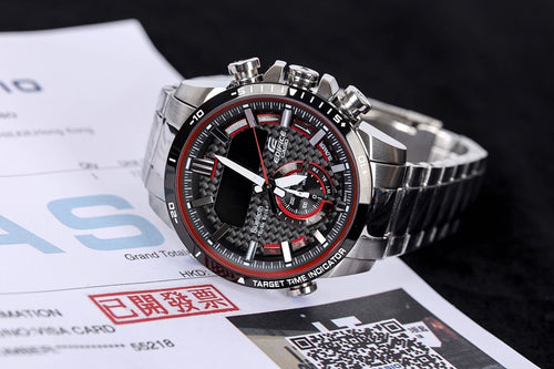 Stainless steel chronograph watch with black dial, red markers, metal bracelet