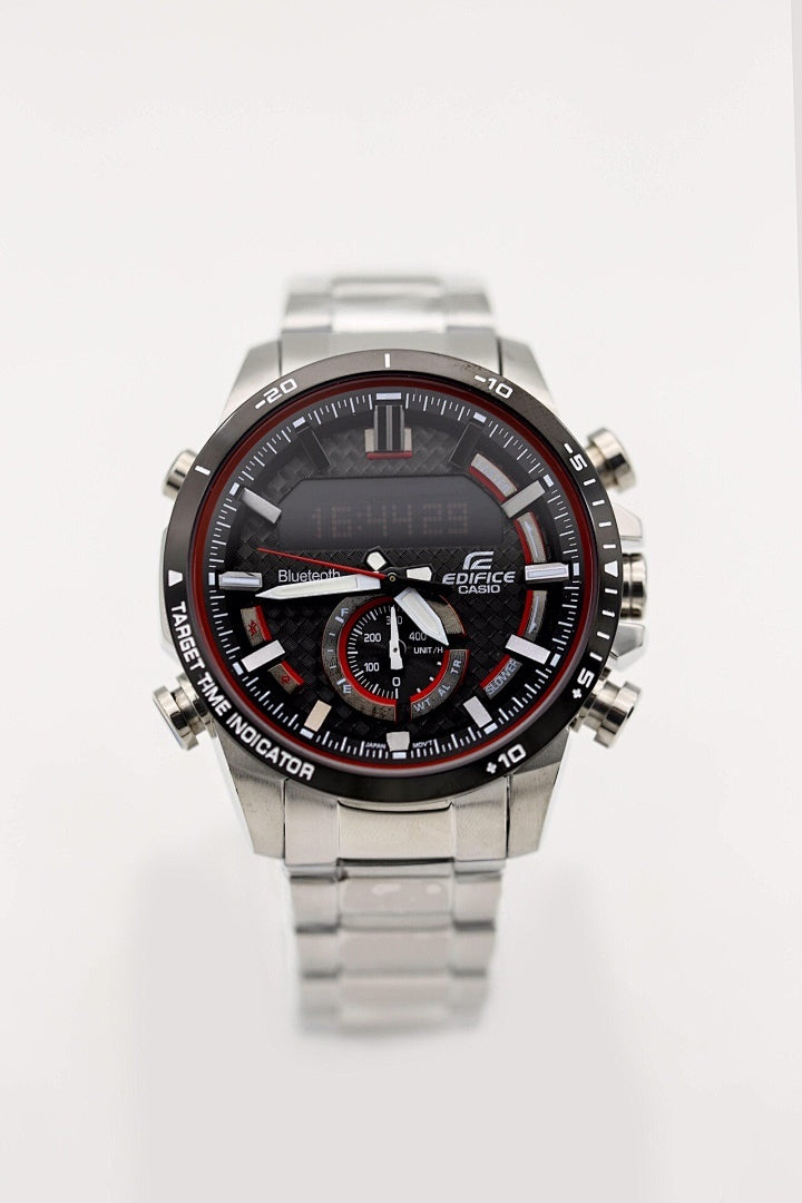 Stainless steel chronograph watch with black dial and red detailing, metal bracelet