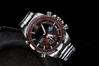 Casio watch with black dial, red bezel markers, and silver metal bracelet