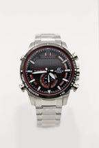 Casio watch with black dial and red detailing, silver metal bracelet