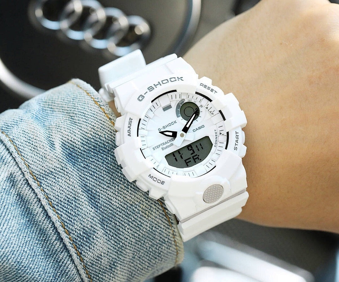 Casio watch with white silicone strap, black dial and dark digital display