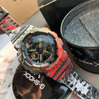 Casio G-Shock watch close-up, red patterned strap and dark dial with yellow hands