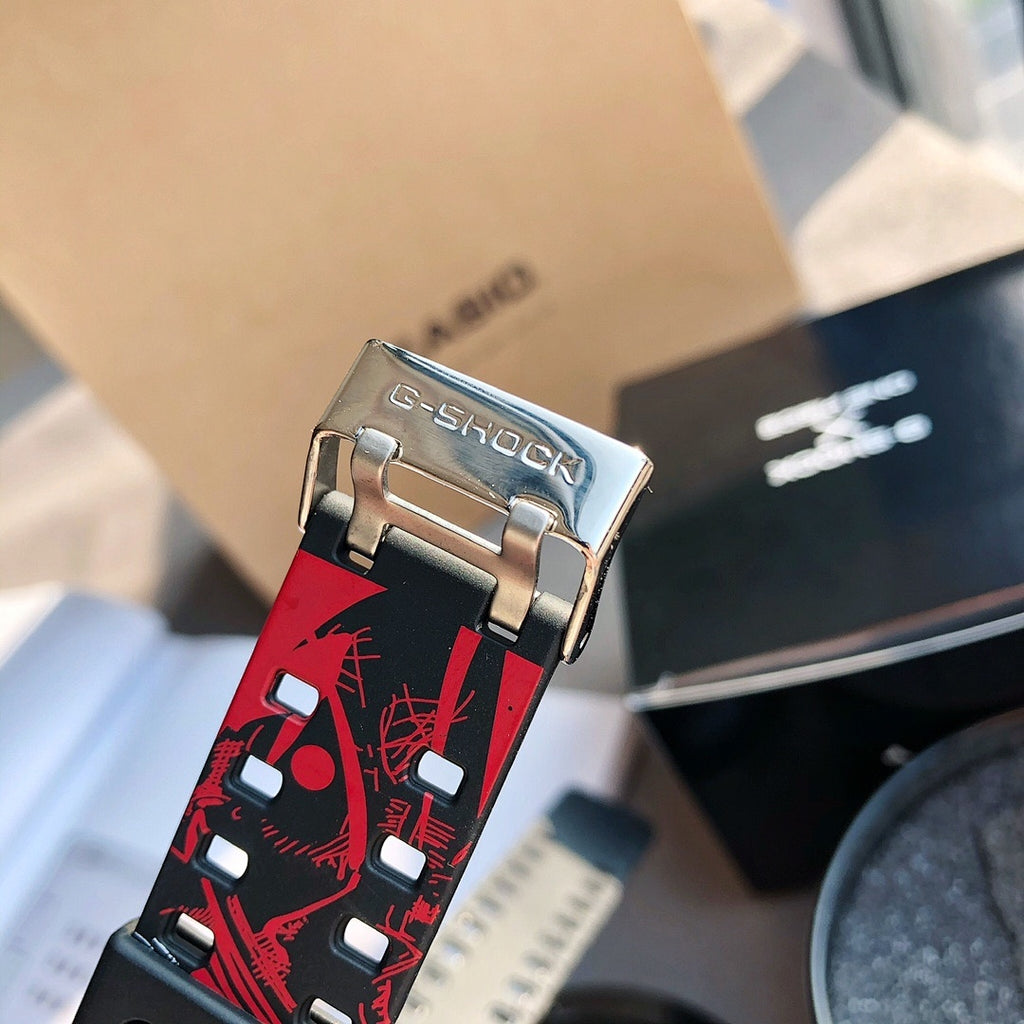 Casio G-Shock watch back view, metal buckle and red patterned resin strap