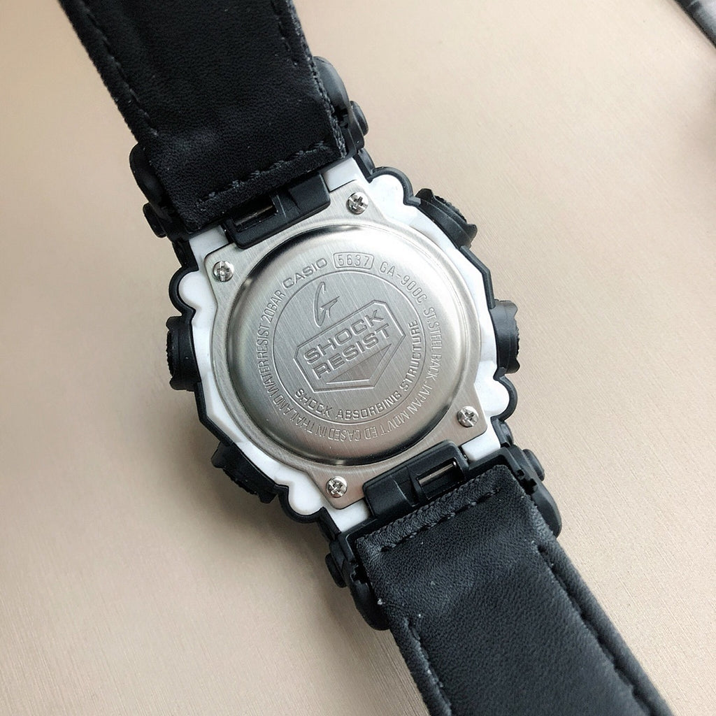 Casio G-Shock watch caseback with stamped dial on black leather-like strap
