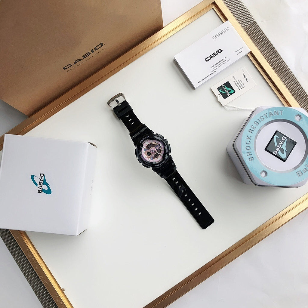 Casio wrist watch on display with black strap, shown with box and label set