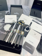 Chanel watch set with multiple square watches on display