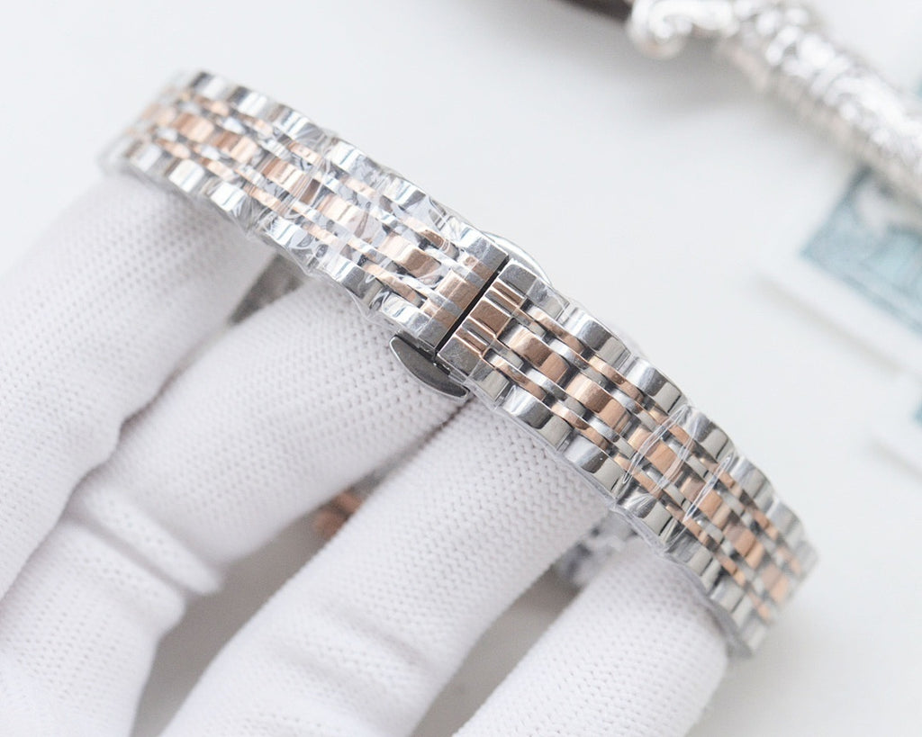 Chanel wristwatch with silver metal bracelet and white dial