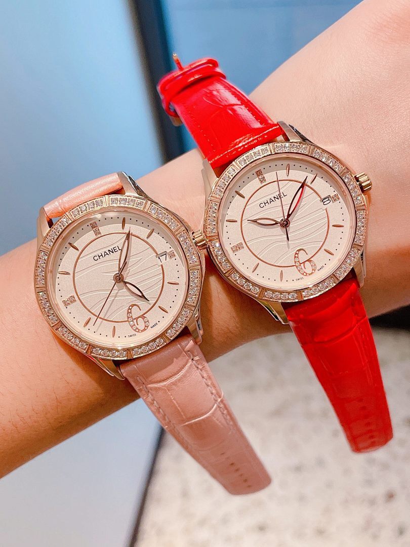Wristwatch set with rose-gold bezels, white dials, and red & blush leather straps
