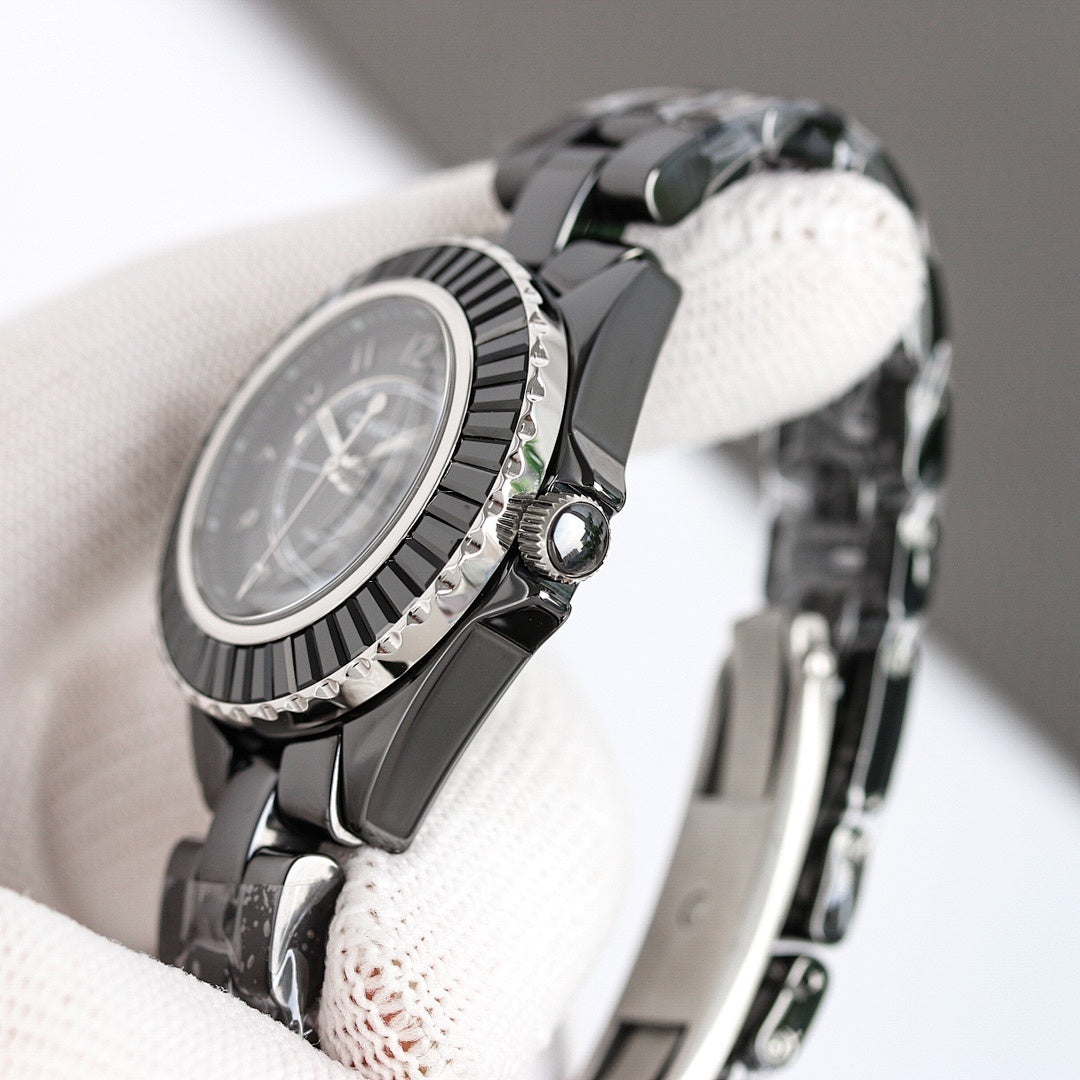 Chanel automatic wristwatch side view, black bezel and crown with steel bracelet