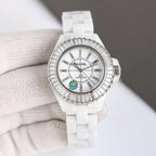 Chanel watch with white ceramic link strap and jeweled silver-tone bezel, white dial.