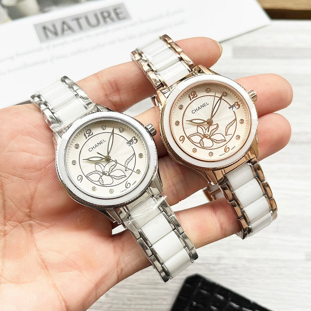 Pair of Chanel watches with white metal bracelets and floral dials; silver-tone and rose-gold