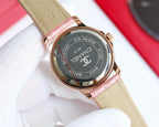 Chanel watch with pink leather strap, rose-gold case back marked with INOX and QUARZ