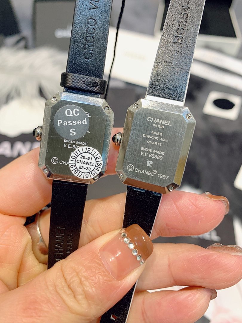 Chanel watch case backs with QC Passed S stamp on dark leather straps