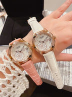 Chanel watches with pink and white leather straps, gold-tone cases and floral dials