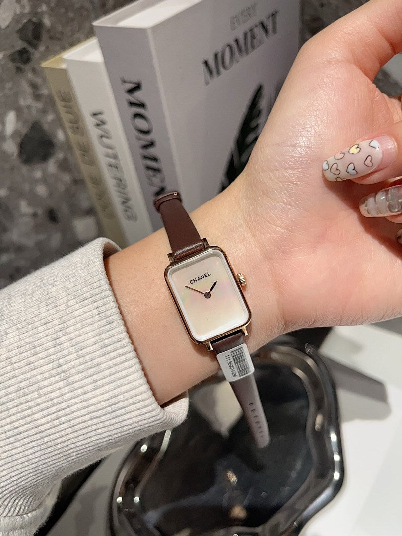 Chanel square-faced wristwatch with brown leather strap and light dial