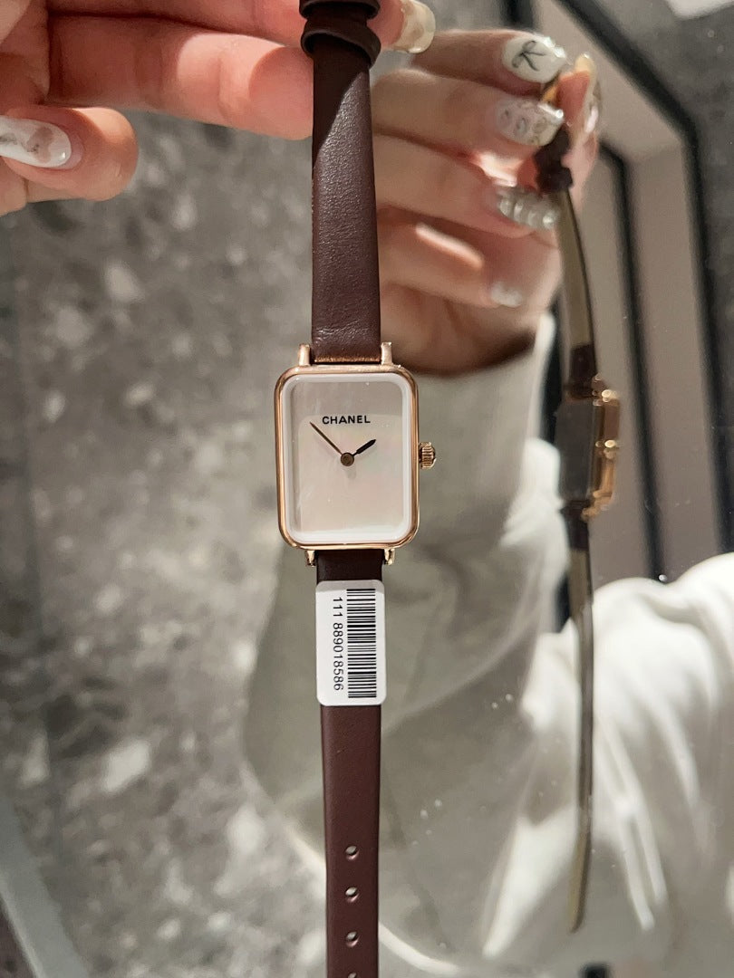 Chanel square-faced wristwatch with brown leather strap and light dial