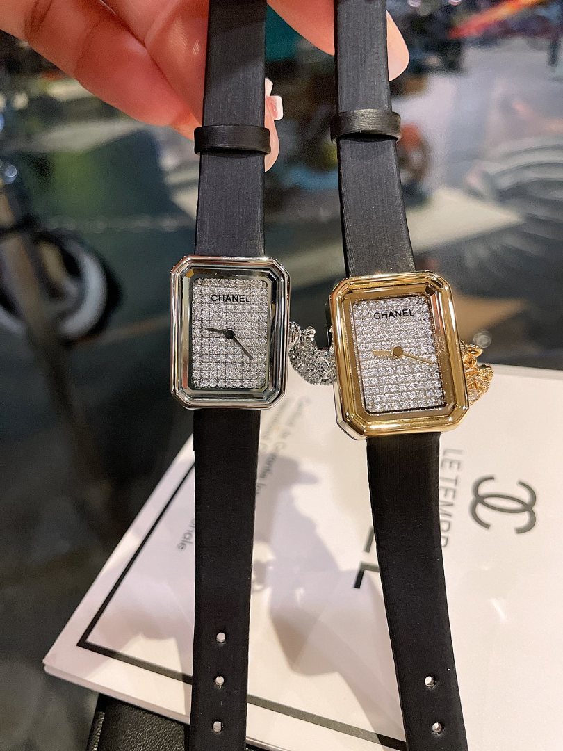 Chanel watches on black straps: square silver-tone and gold-tone dial cases