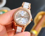 Chanel watch with white ceramic strap, rose-gold case, round white dial and date window