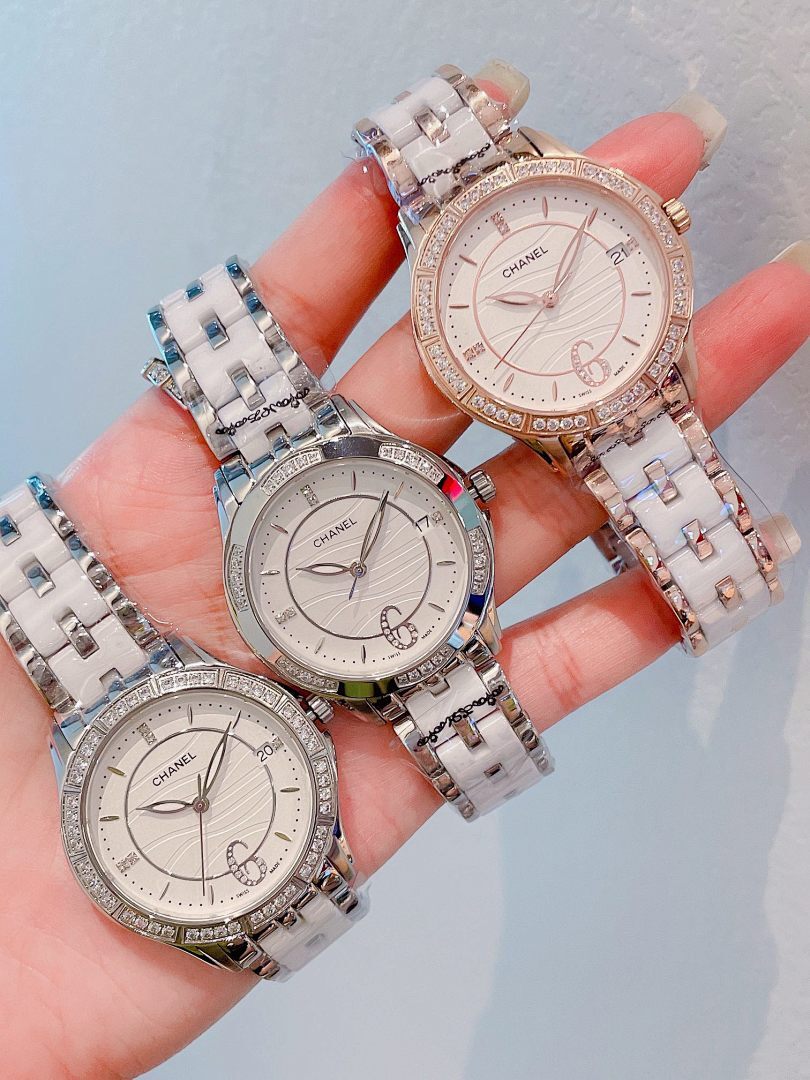 Chanel wristwatch with silver link bracelet, white dial, rose-gold diamond bezel