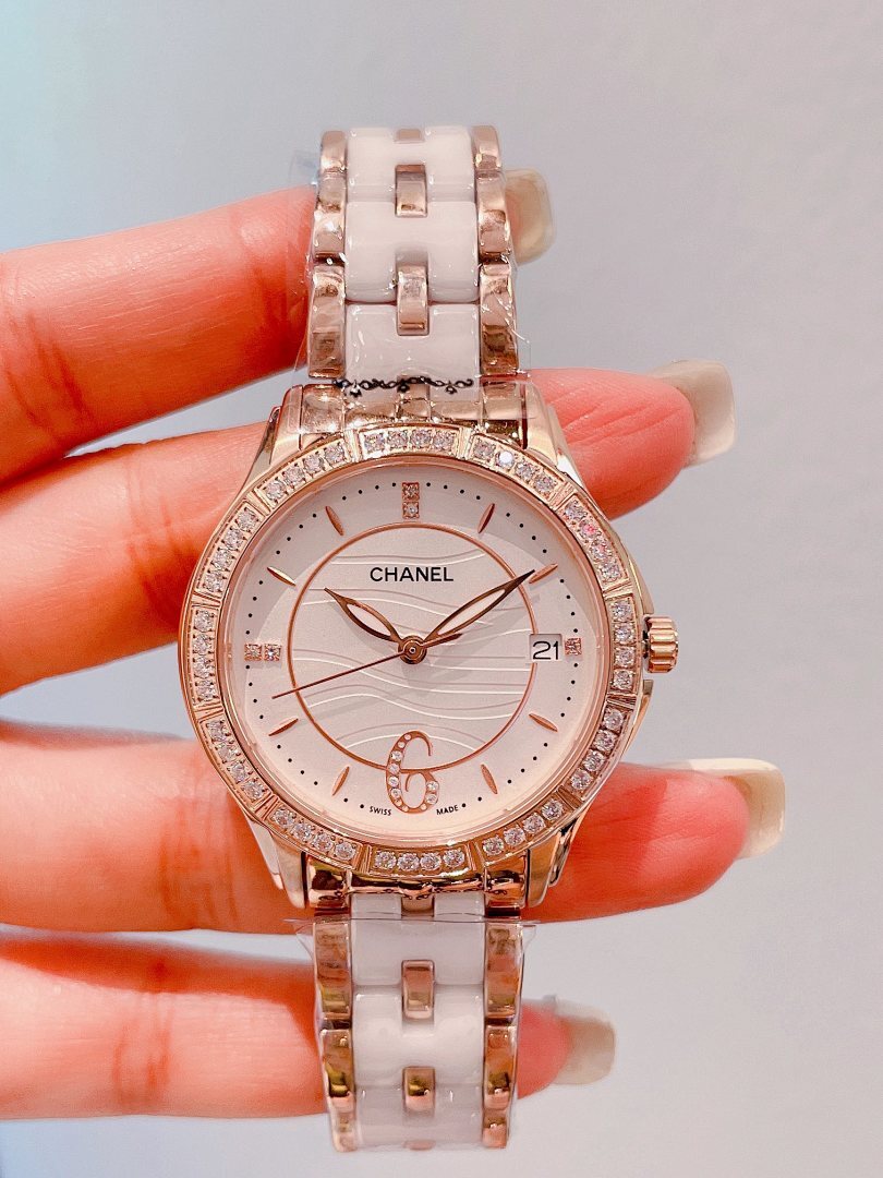 Chanel wristwatch with rose-gold bezel, white dial, silver link bracelet