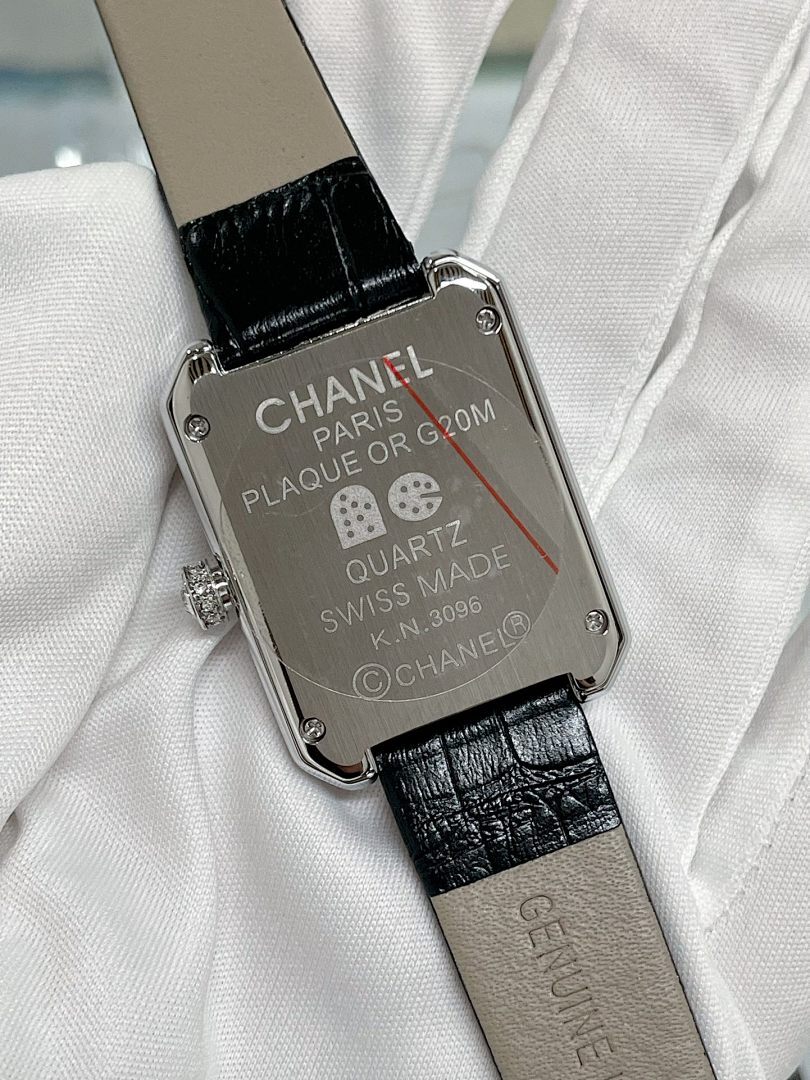 Square watch back with CHANEL, Quartz, Swiss made, and stainless case