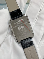 Square watch back with CHANEL, Quartz, Swiss made, and stainless case