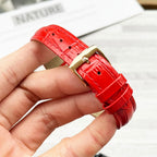 Chanel watch with red leather strap, gold-tone buckle and clasp on the wristband