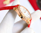 Chanel watch, red leather strap, rose-gold case, white clover dial