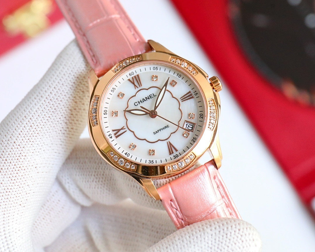Chanel watch, pale pink leather strap, rose-gold case, white clover dial
