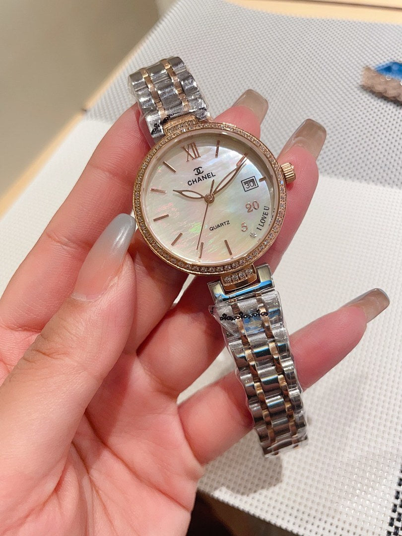 Rose-gold Chanel wrist watch with metal bracelet, round white dial and Roman numerals