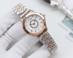 Two-tone analog wristwatch with rose gold case, silver links, and white dial